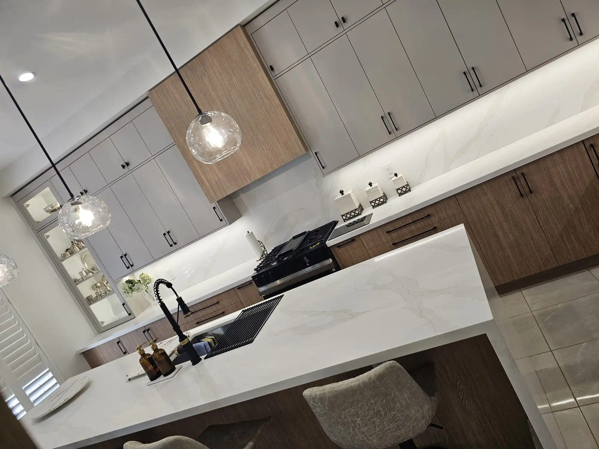 Custom cabinetry and millwork by Pine Kitchen Design Inc.